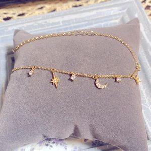 Gold Tone Moon And Stars Bracelet. NWT